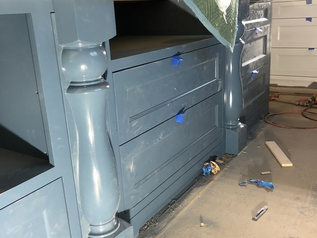 Island cabinet with a turned post
