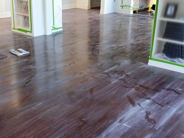 Glossy wood floors through a doorway