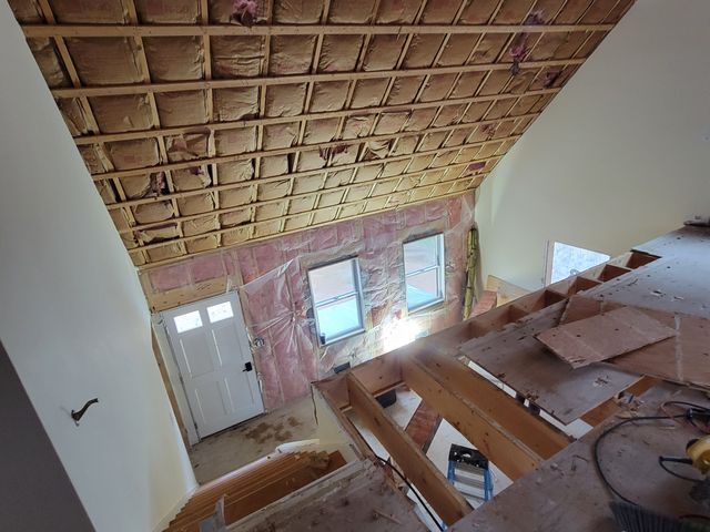 Ceiling framing in a room with new windows