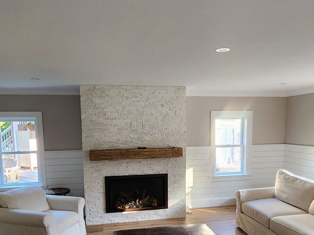 Remodeled living room with fireplace