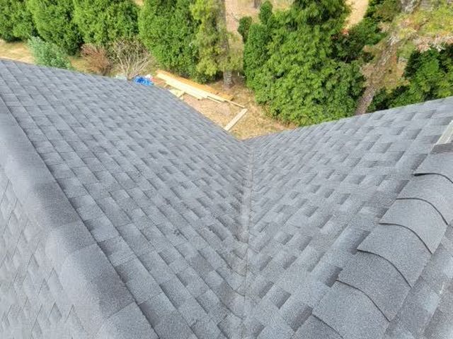 Asphalt shingle roof valley