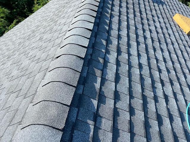 Asphalt shingle roof ridge line