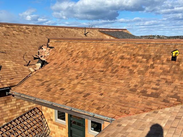 View across wood shingle roofs