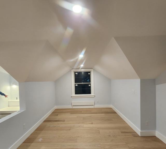 Finished attic room with oak floors